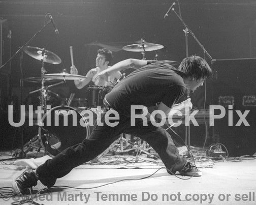 Black and white photo of Nate Barcalow of Finch in concert in 2002 by Marty Temme