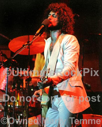 Photos of Guitarist Lindsey Buckingham of Fleetwood Mac Playing a Gibson Les Paul in Concert in 1977 by Marty Temme