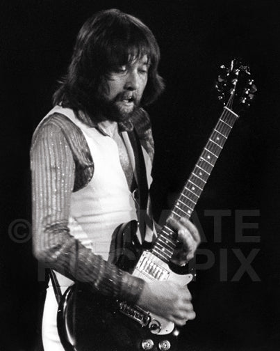 Photo of guitarist Rod Price of Foghat in concert in 1980 by Marty Temme