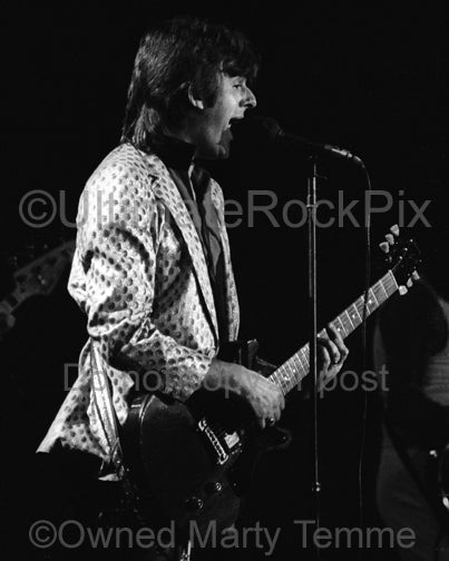 Photo of singer Dave Peverett of Foghat in concert in 1980 by Marty Temme