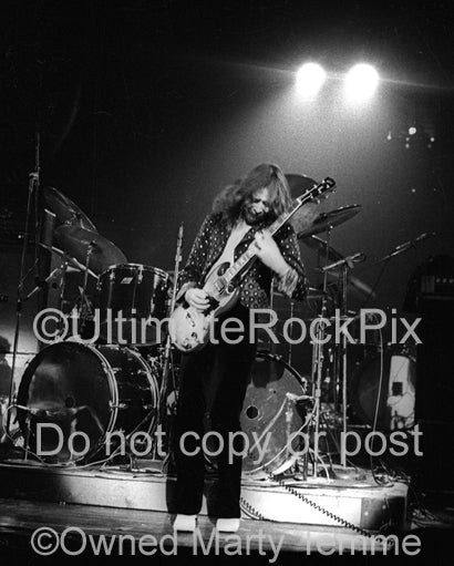 Photo of guitarist Rod Price of Foghat in concert in 1973 by Marty Temme