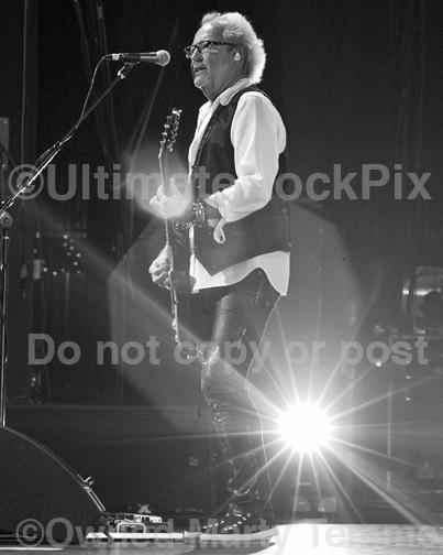 Black and white photos of Mick Jones of Foreigner in concert by Marty Temme