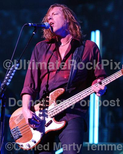 Photos of Bass Player and Singer Jeff Pilson of Foreigner in Concert in 2010 by Marty Temme