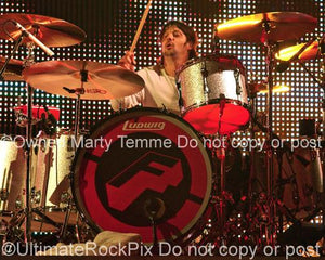 Photos of Drummer Jason Sutter of Foreigner and Chris Cornell Performing in Concert in 2010 by Marty Temme