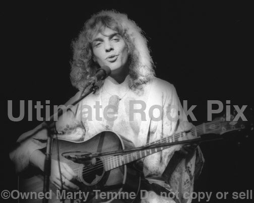 Black and white photo of Peter Frampton in concert in 1976 by Marty Temme