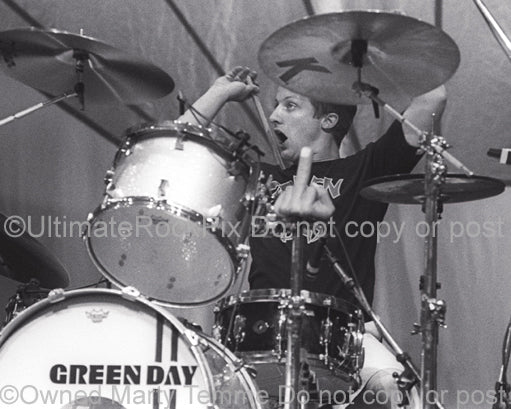 Photo of drummer Tre Cool of Green Day in concert by Marty Temme