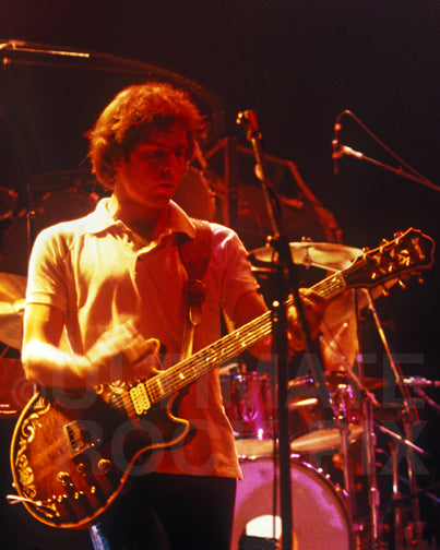 Photo of Bob Weir of The Grateful Dead in concert in 1983 by Marty Temme
