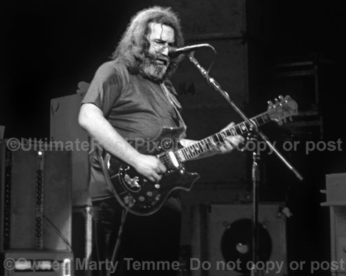 Black and white photo of Jerry Garcia of The Grateful Dead in concert by Marty Temme