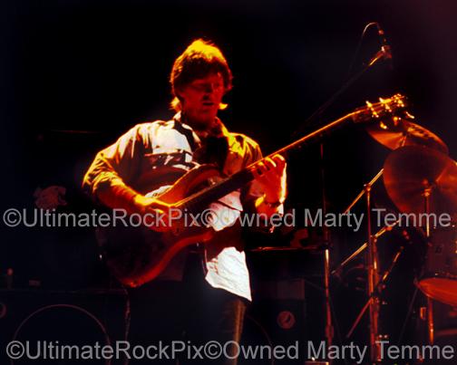 Photos of Phil Lesh of The Grateful Dead in Concert in the 1980's by Marty Temme
