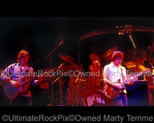 Photos of Phil Lesh and Bob Weir of The Grateful Dead in Concert in the 1980's by Marty Temme