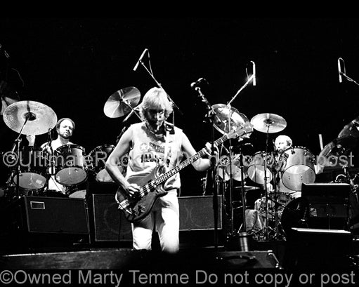 Photo of Phil Collins, Mike Rutherford and Chester Thompson of Genesis in 1978 by Marty Temme