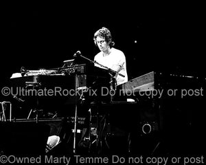 Photo of keyboardist Tony Banks of Genesis in concert in 1978 by Marty Temme