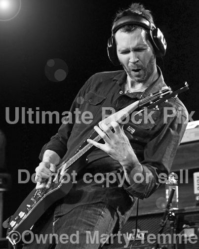 Black and white photo of guitar player Paul Gilbert of Mr. Big performing in concert in 2012 by Marty Temme