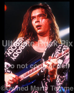 Photo of Paul Gilbert of Mr. Big in concert in 1991 by Marty Temme