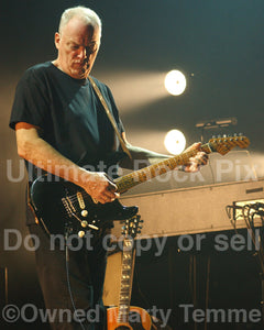 Photo of guitarist David Gilmour performing onstage by Marty Temme