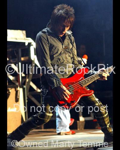 Photos of Bass Player Tommy Stinson of Guns N' Roses Performing Onstage by Marty Temme