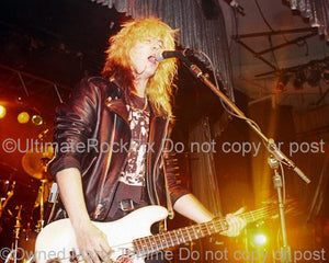 Photos of Bassist Duff McKagan of Guns N' Roses Performing Onstage in 1990 by Marty Temme