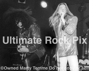 Black and white photo of Axl Rose and Slash of Guns N' Roses in concert in 1989 by Marty Temme