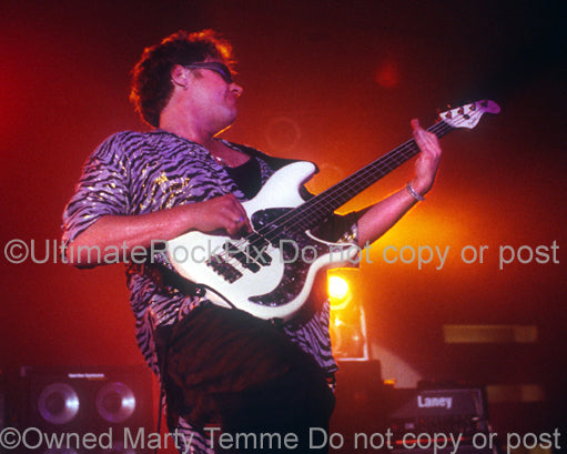 Photo of bass player Stu Hamm in concert in 1998 by Marty Temme