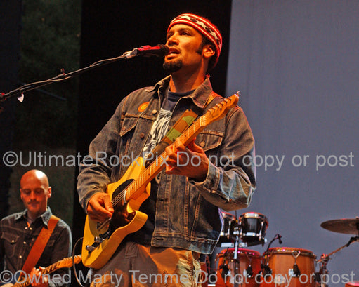 Photo of Ben Harper playing a Telecaster in concert in 2006 by Marty Temme
