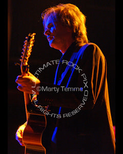Photo of guitarist Craig Bartock of Heart in concert by Marty Temme