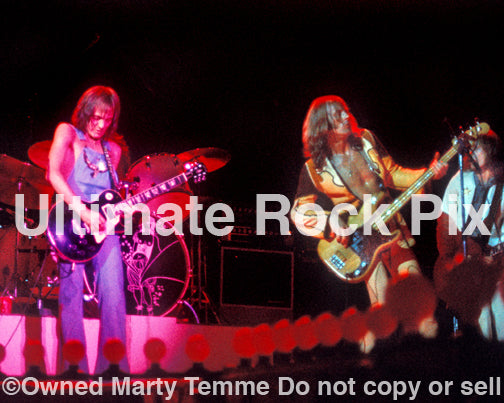 Photo of Steve Marriott and Greg Ridley of Humble Pie in concert in 1973 by Marty Temme