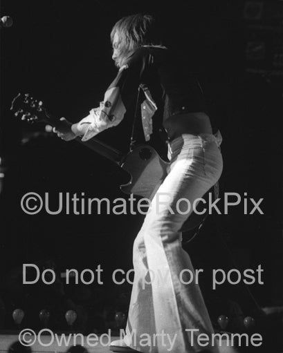 Photo of Steve Marriott of Humble Pie playing a Les Paul in concert by Marty Temme