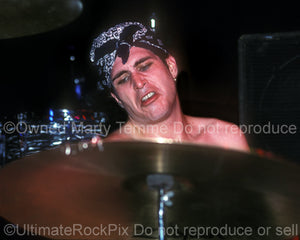 Photos of drummer Hunt Sales in concert in 1990 by Marty Temme
