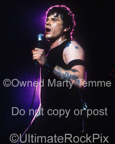 Photo of vocalist Ian Astbury of The Cult performing in concert by Marty Temme