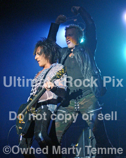 Photo of singer Billy Idol and Steve Stevens onstage in 2005 by Marty Temme