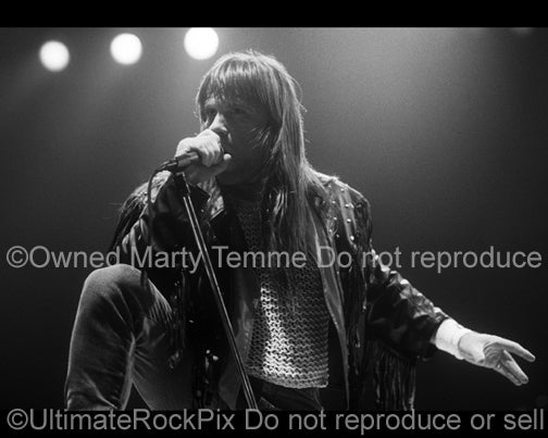 Black and white photo of vocalist Bruce Dickinson of Iron Maiden in concert in 1991 by Marty Temme