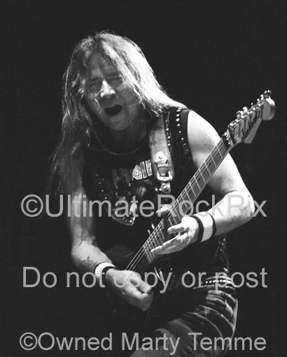 Black and white photo of guitar player Dave Murray of Iron Maiden in concert in 1991 by Marty Temme