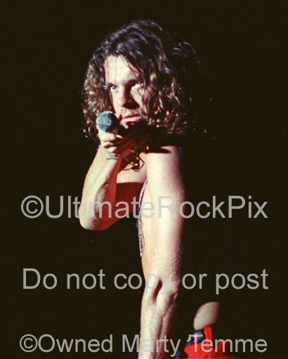 Photo of singer Michael Hutchence of INXS in concert by Marty Temme
