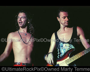Photo of Michael Hutchence and Garry Gary Beers of INXS in concert in 1988 by Marty Temme