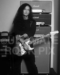 Black and white photo of Jake E. Lee with his amplifiers in 1995 by Marty Temme