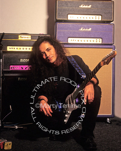 Photo of Jake E. Lee with his guitar and amps during a photo shoot in 1995 by Marty Temme