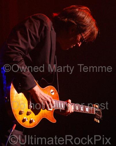Photo of Joe Bonamassa playing a Gibson Les Paul in concert by Marty Temme
