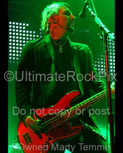 Photos of Bass Player Johnny Colt of The Black Crowes and Lynyrd Skynyrd in Concert by Marty Temme