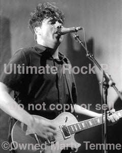 Photo of Jim Adkins of Jimmy Eat World in concert by Marty Temme