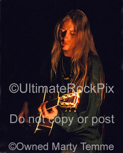 Photo of Jerry Cantrell of Alice In Chains playing acoustic guitar by Marty Temme