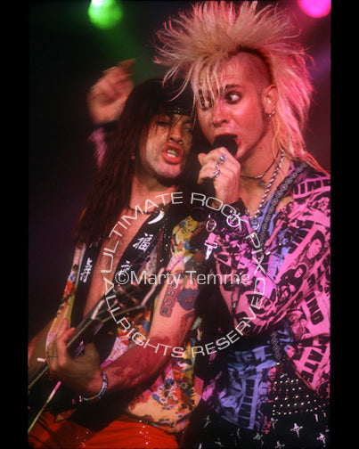 Photo of Mickey Finn and Fernie Rod of Jetboy in concert in 1988 by Marty Temme