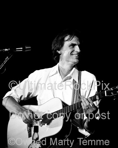 Photo of singer-songwriter James Taylor in concert in the 1970's by Marty Temme
