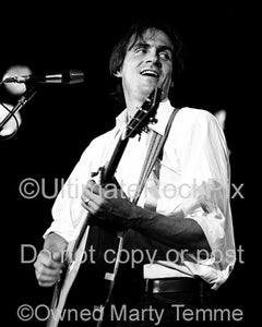 Black and white photo of singer-songwriter James Taylor in concert in the 1970's by Marty Temme