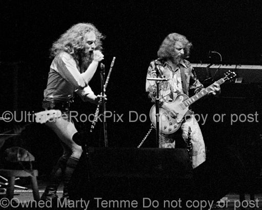 Photo of Ian Anderson and Martin Barre of Jethro Tull in concert in 1973 by Marty Temme