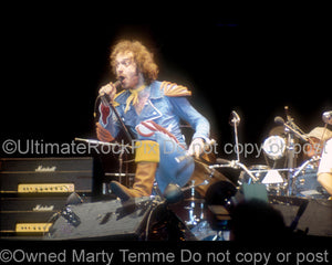 Photo of Ian Anderson of Jethro Tull performing onstage in 1976 by Marty Temme