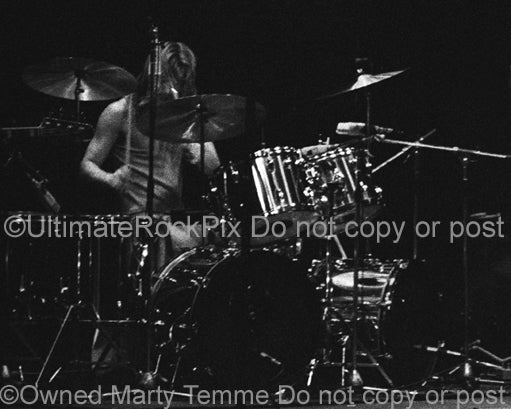 Photo of Barriemore Barlow of Jethro Tull in concert in 1973 by Marty Temme