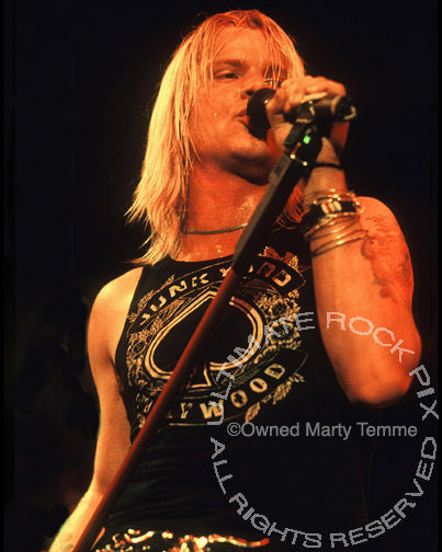 Photo of David Roach of Junkyard in concert in 1991 by Marty Temme