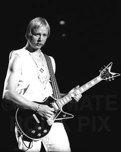 Photo of guitarist Kerry Livgren of Kansas in concert in 1979 by Marty Temme
