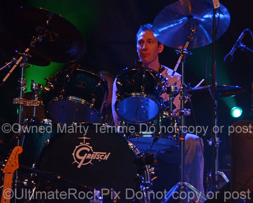 Photo of drummer Kofi Baker in concert in 2013 by Marty Temme