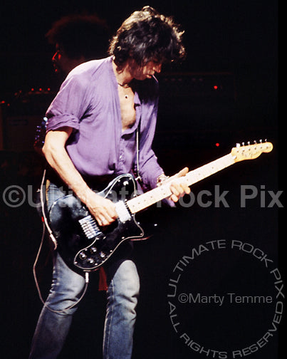 Photo of Keith Richards of The Rolling Stones playing a Telecaster Custom in concert in 1979 by Marty Temme